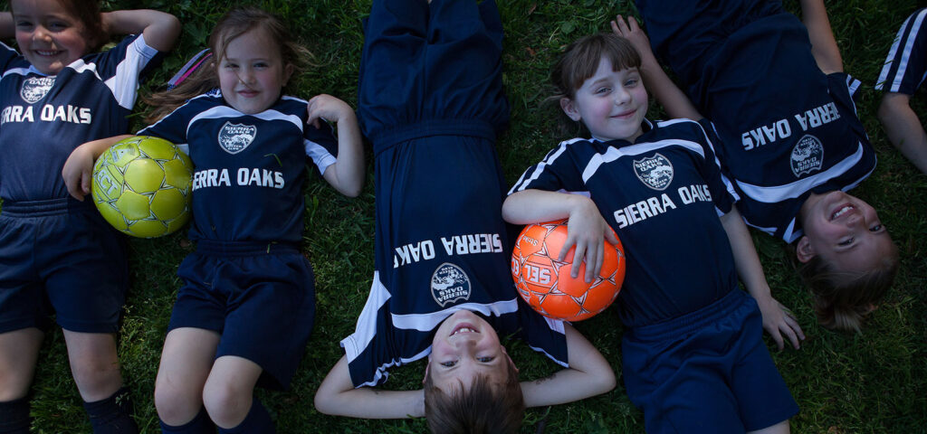 Arial shot of Sierra Oaks Team where players are laying on the ground.