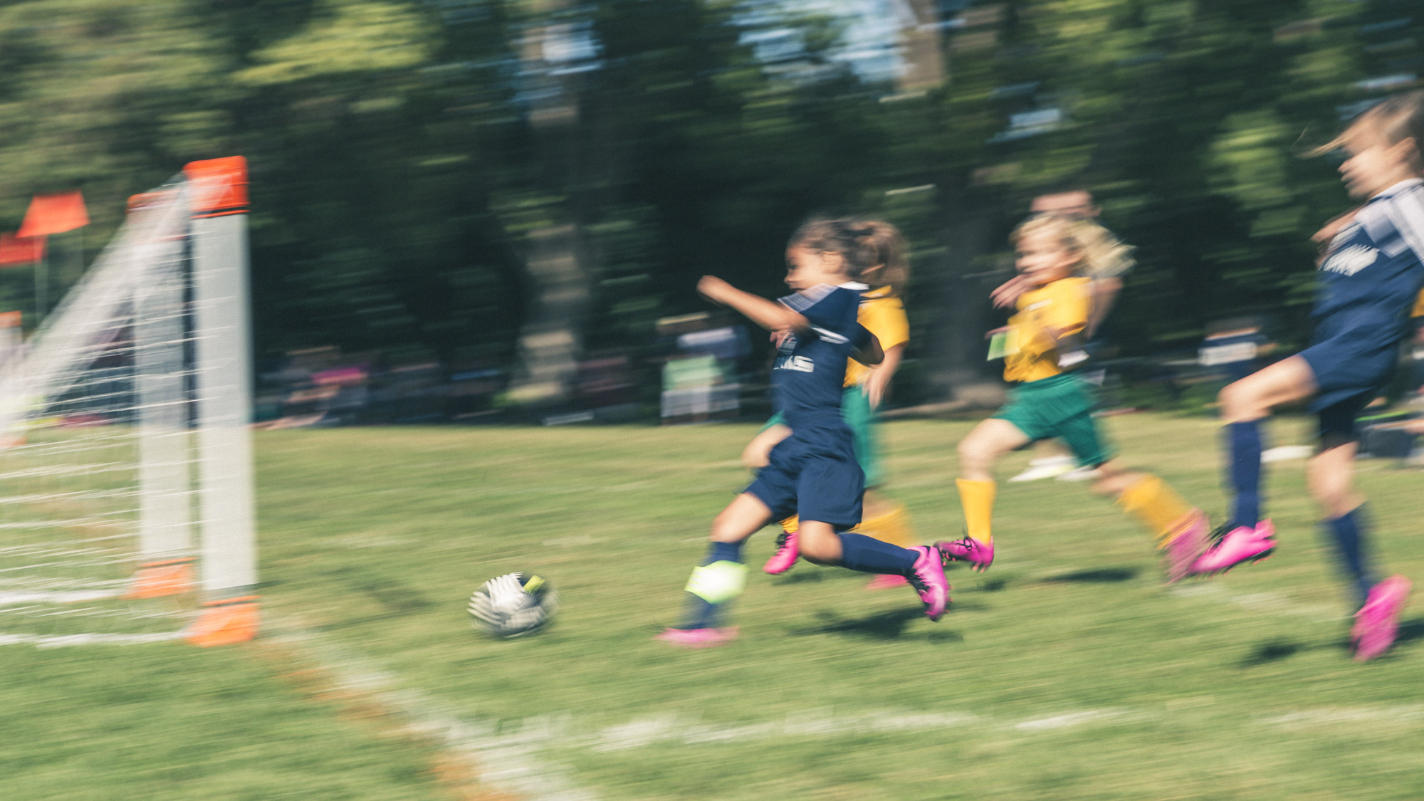 u8 Girls player scoring a goal